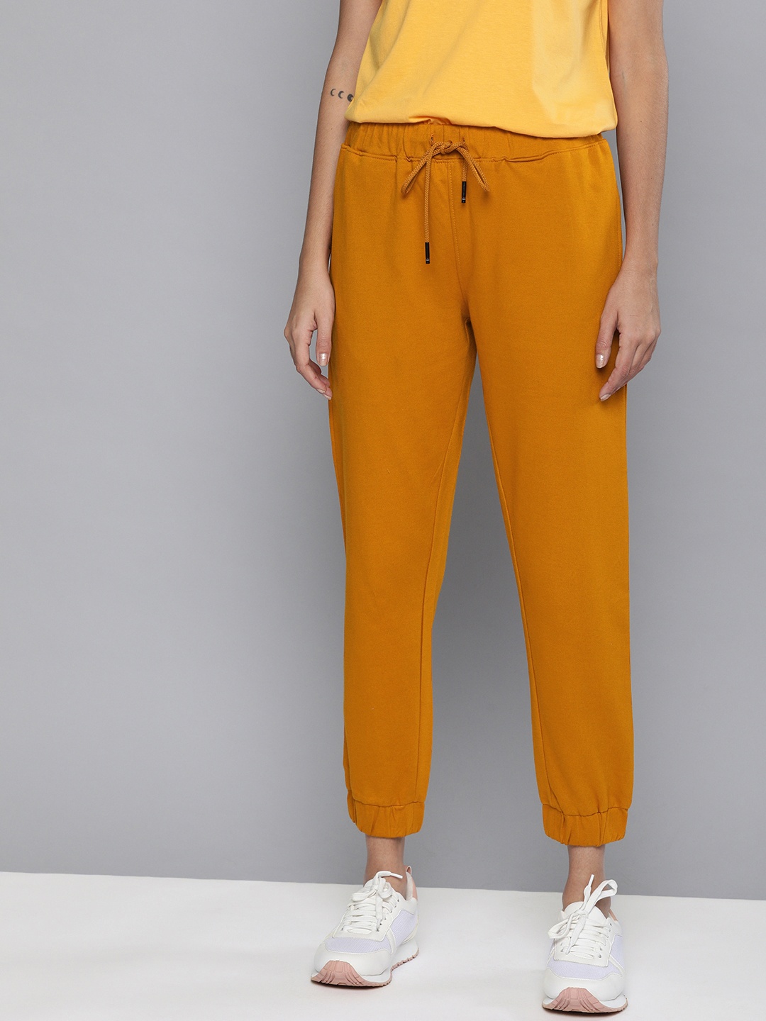 

Mast & Harbour Women Mustard Yellow Solid Pure Cotton Joggers
