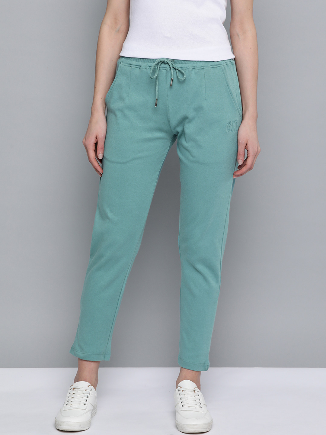 

Mast & Harbour Women Sea Green Solid Pure Cotton Track Pants