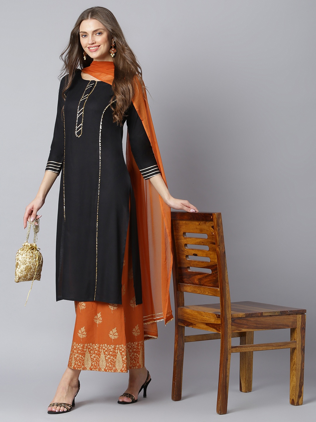 

Khushal K Women Black Woven Design Kurta with Palazzos & Dupatta