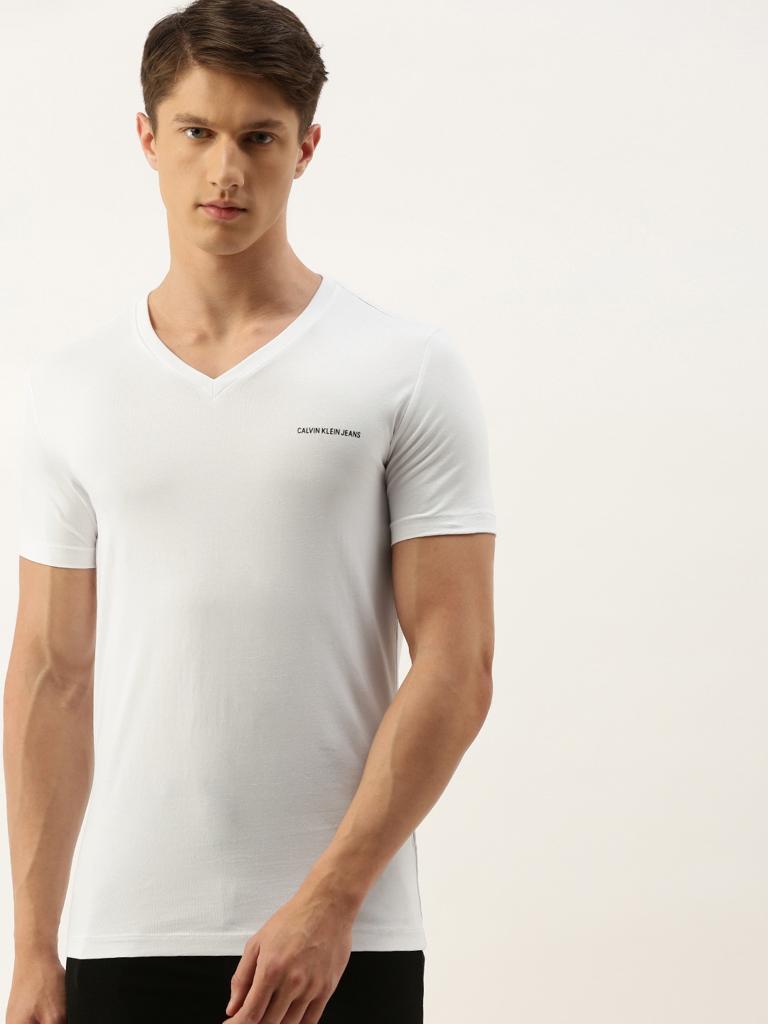 

Calvin Klein Jeans Men White Solid V-Neck T-shirt