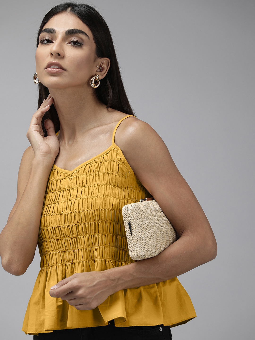 

The Roaster Lifestyle Co. Women Yellow Solid Shoulder Strap Peplum Top With Smocked Detail