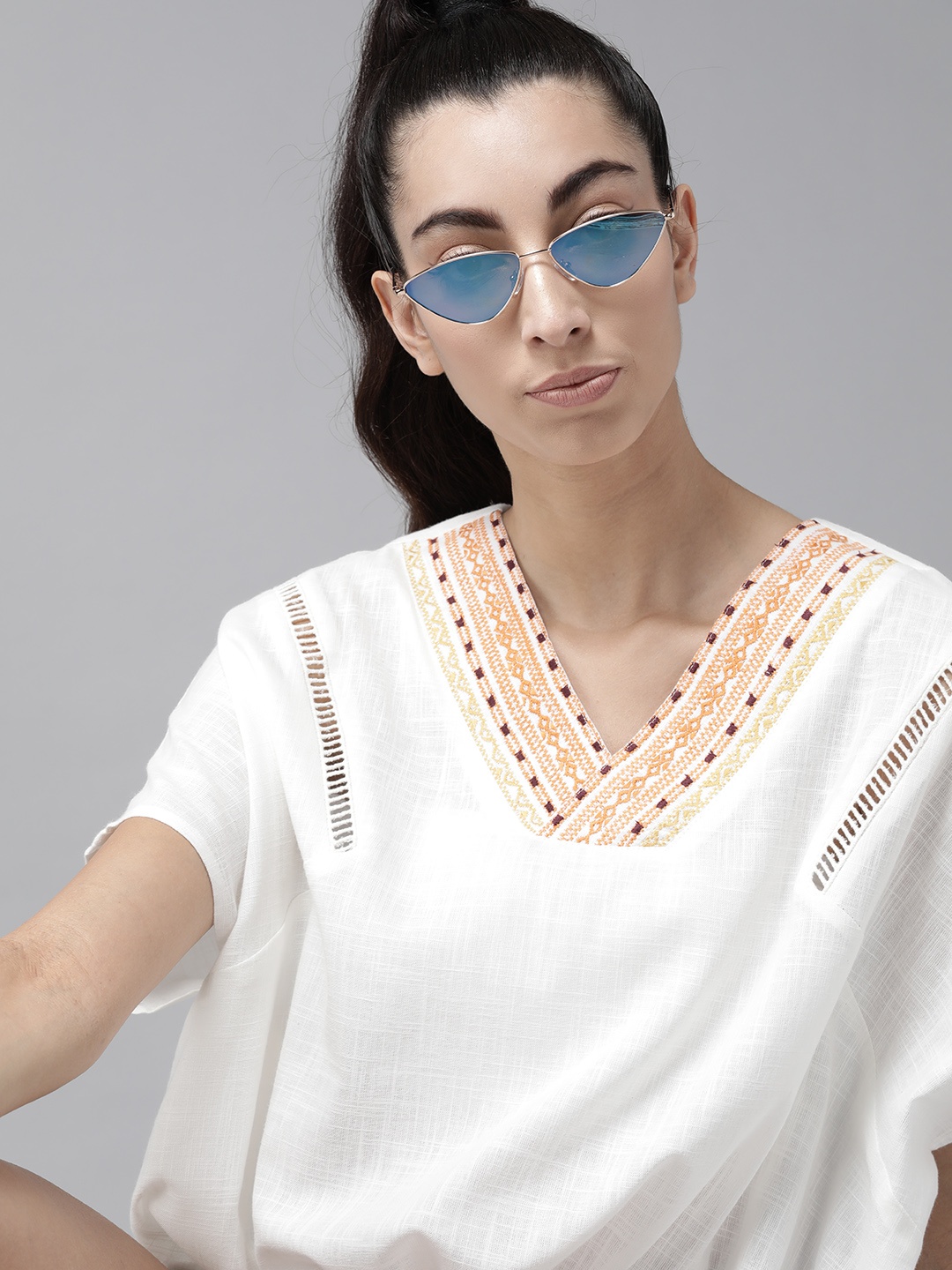 

The Roadster Lifestyle Co White Extended Sleeve Waist Tie-Up Cotton Blouson Top with Embroidered Detail