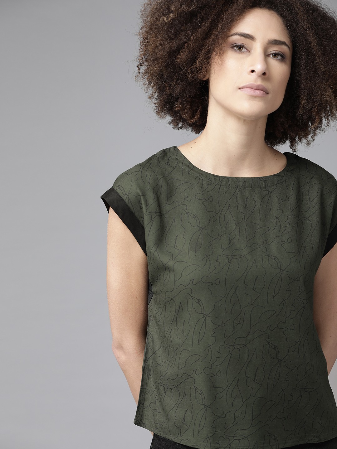 

The Roadster Lifestyle Co Women Ecovero Olive Green Black Printed Regular Top