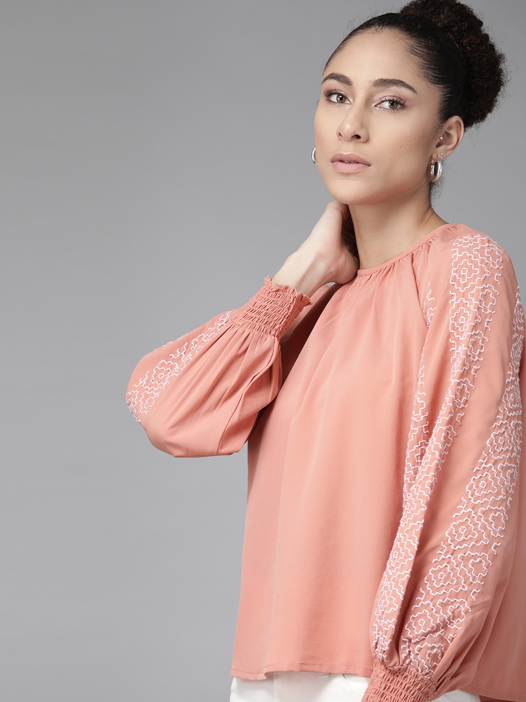 

The Roadster Lifestyle Co Pink Smocked Top with Embroidered Sleeves