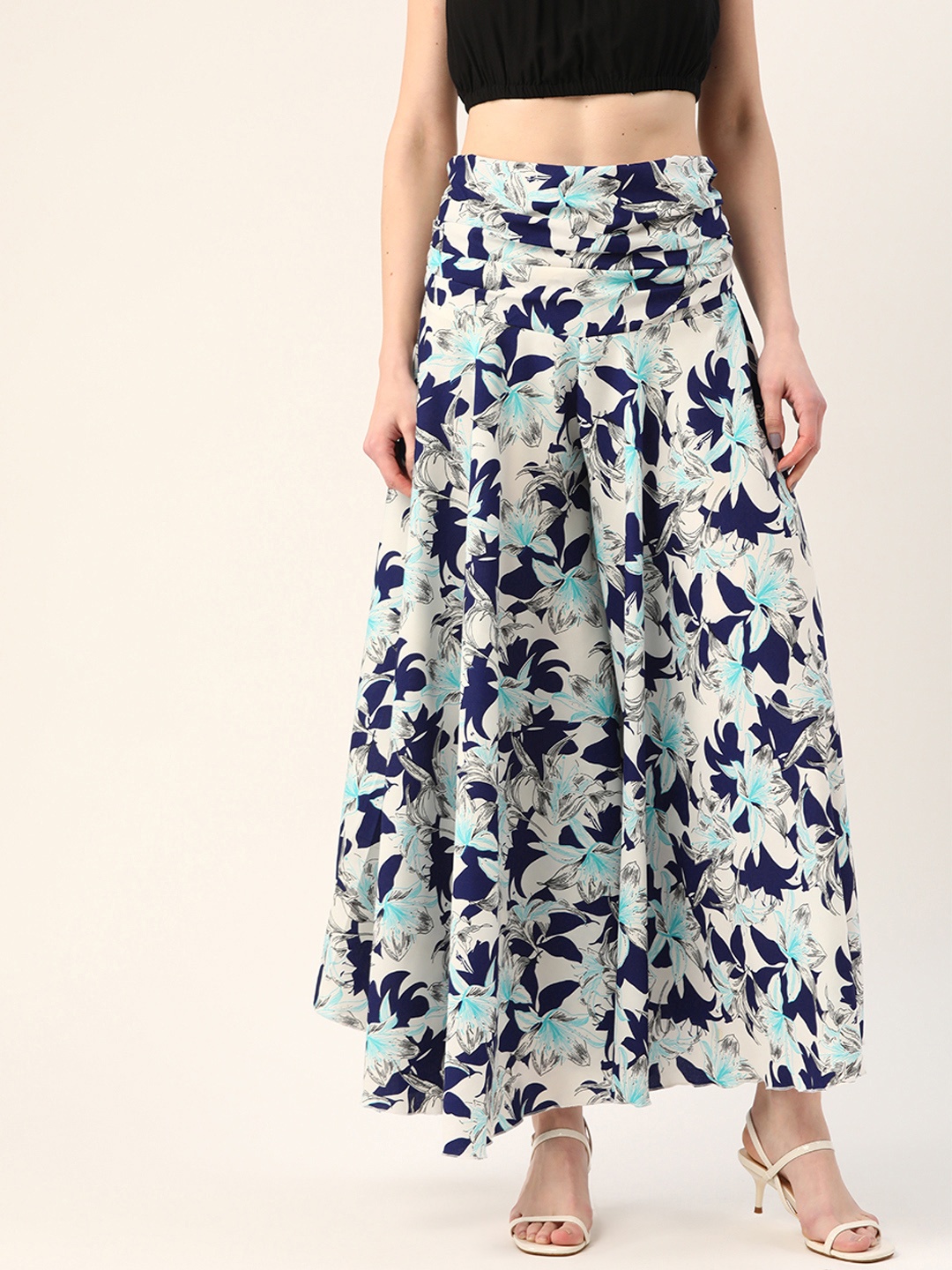 

Trend Arrest Women White & Navy Blue Floral Print Smocked Flared Palazzos