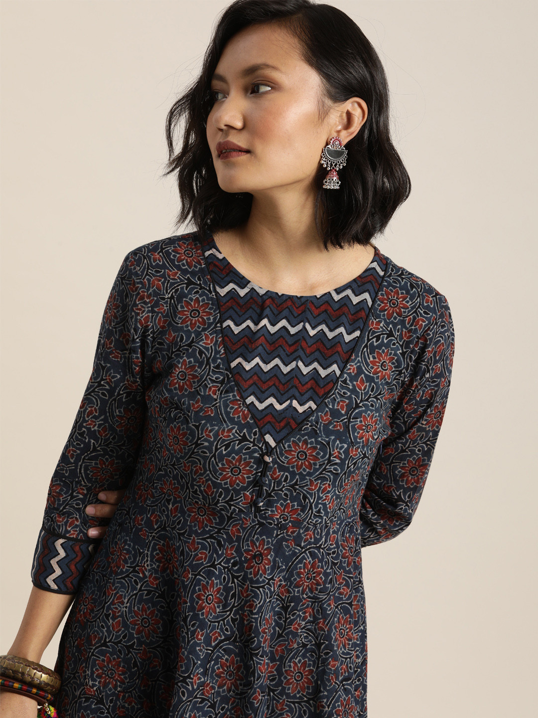 

Taavi Women Navy Blue & Red Ajrakh Hand Block Print Cotton Sustainable A-Line Kurta