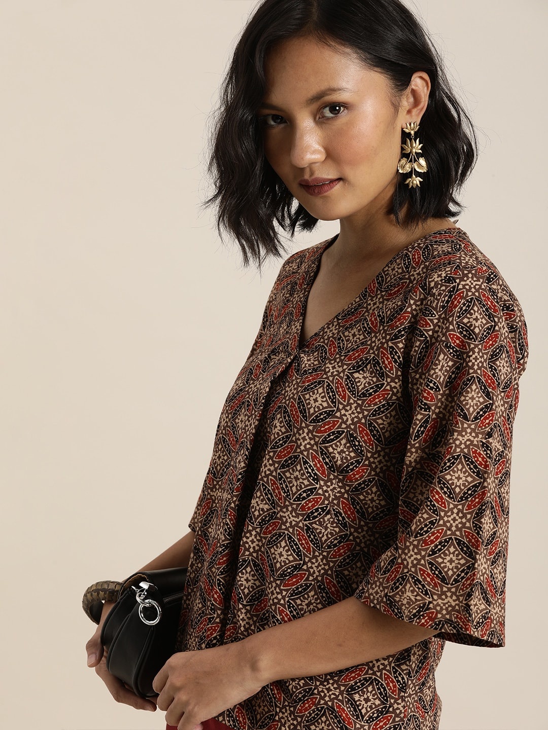 

Taavi Brown & Black Pure Cotton Ajrakh Hand Block Print Top with Pleats