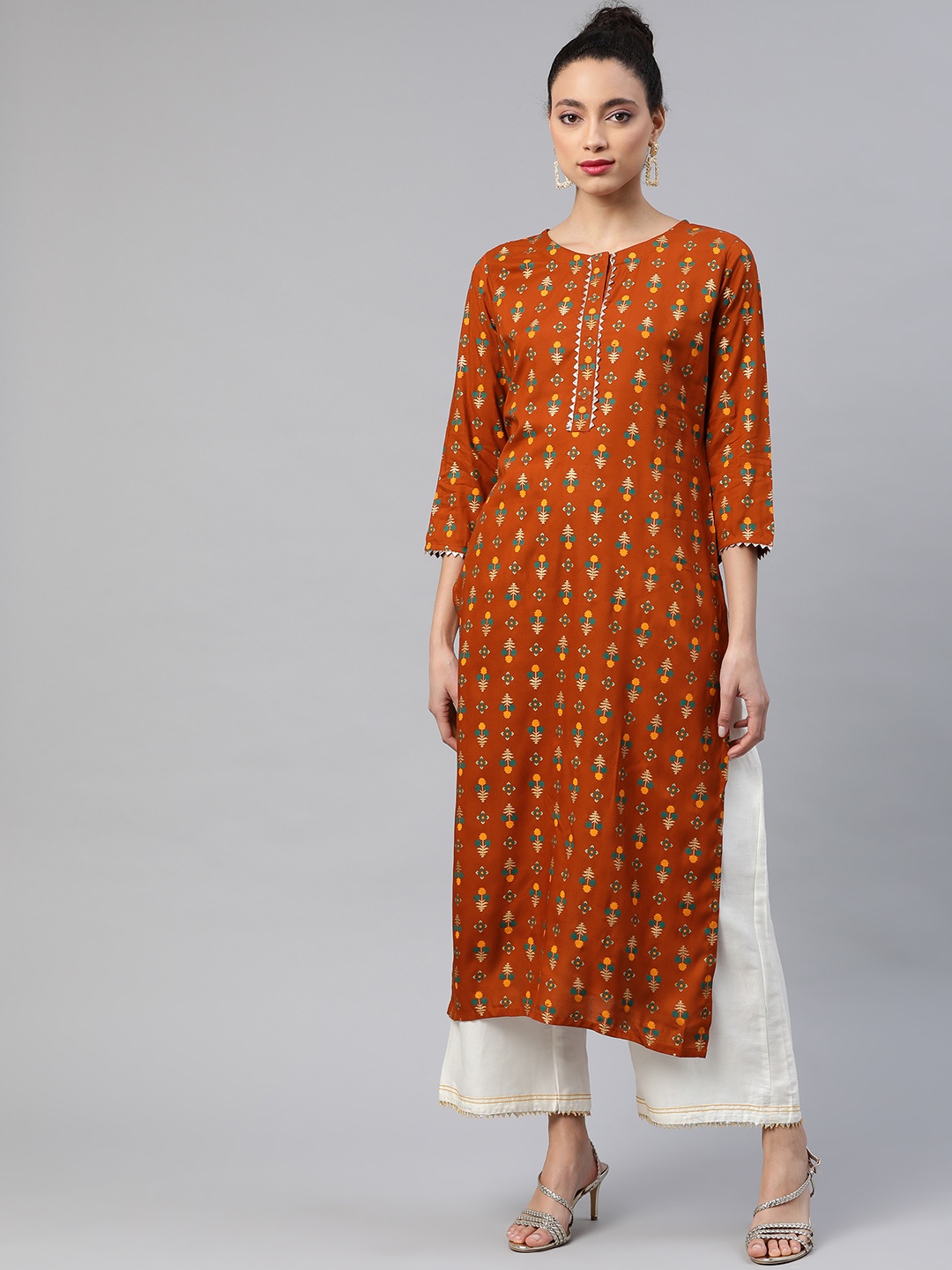 

Indo Era Women Rust Orange & Green Foil Printed Straight Kurta