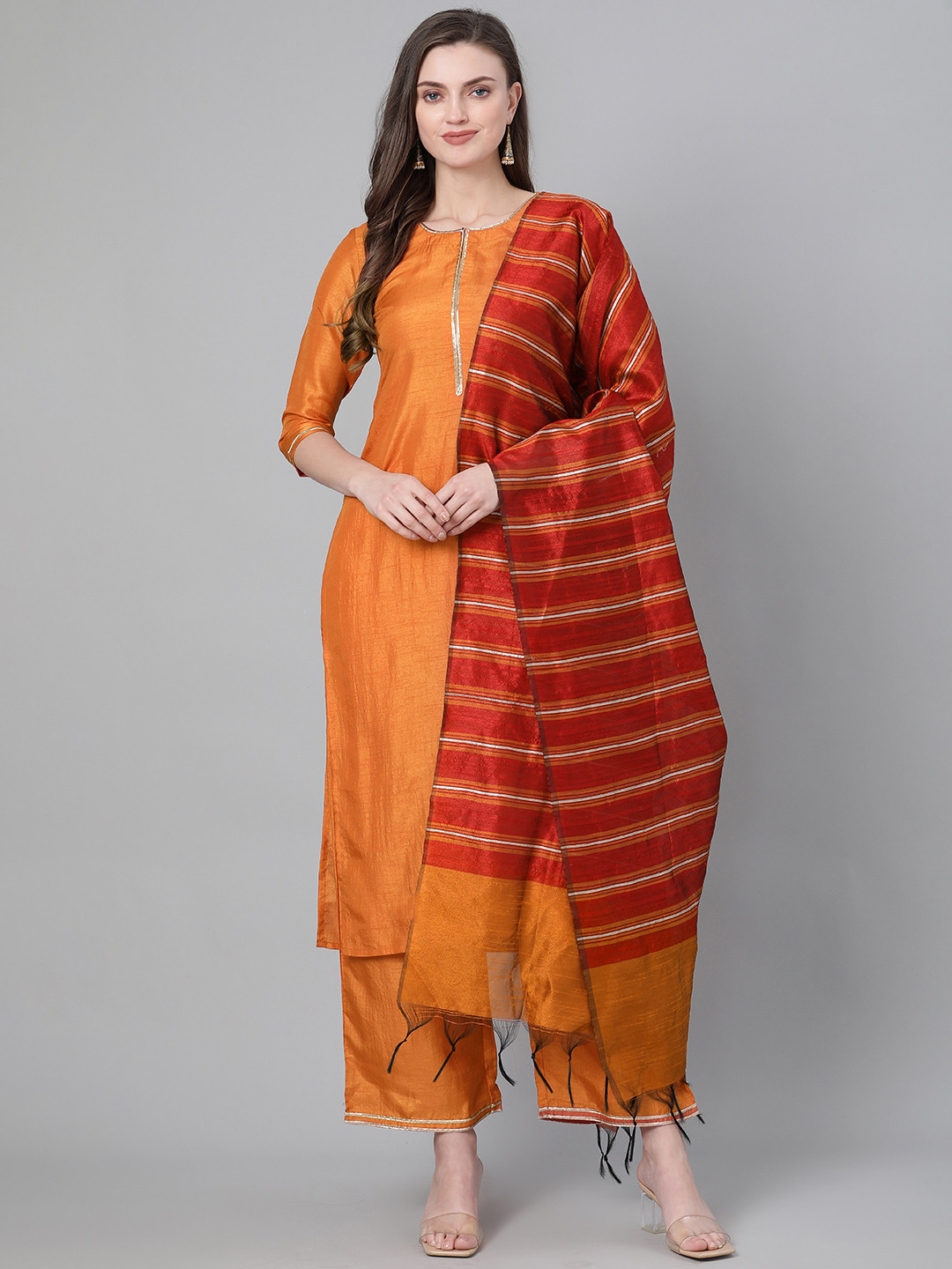 

Indo Era Women Rust Orange & Red Solid Kurta with Palazzos & Dupatta