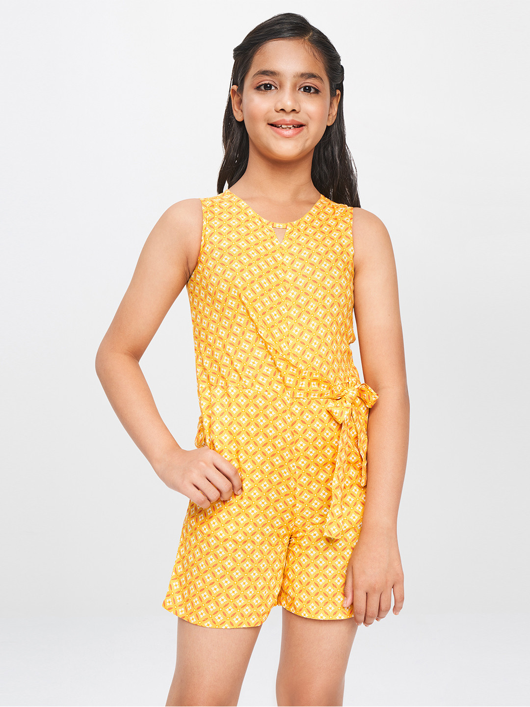 

Global Desi Girls Yellow Printed Basic Jumpsuit