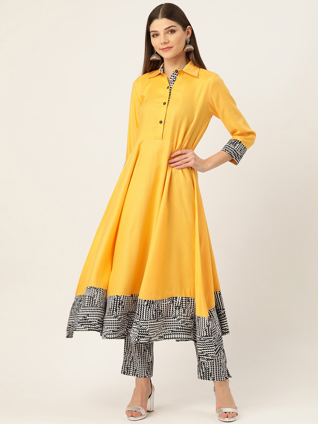 

Cottinfab Women Mustard Yellow & White Solid Kurta with Trousers