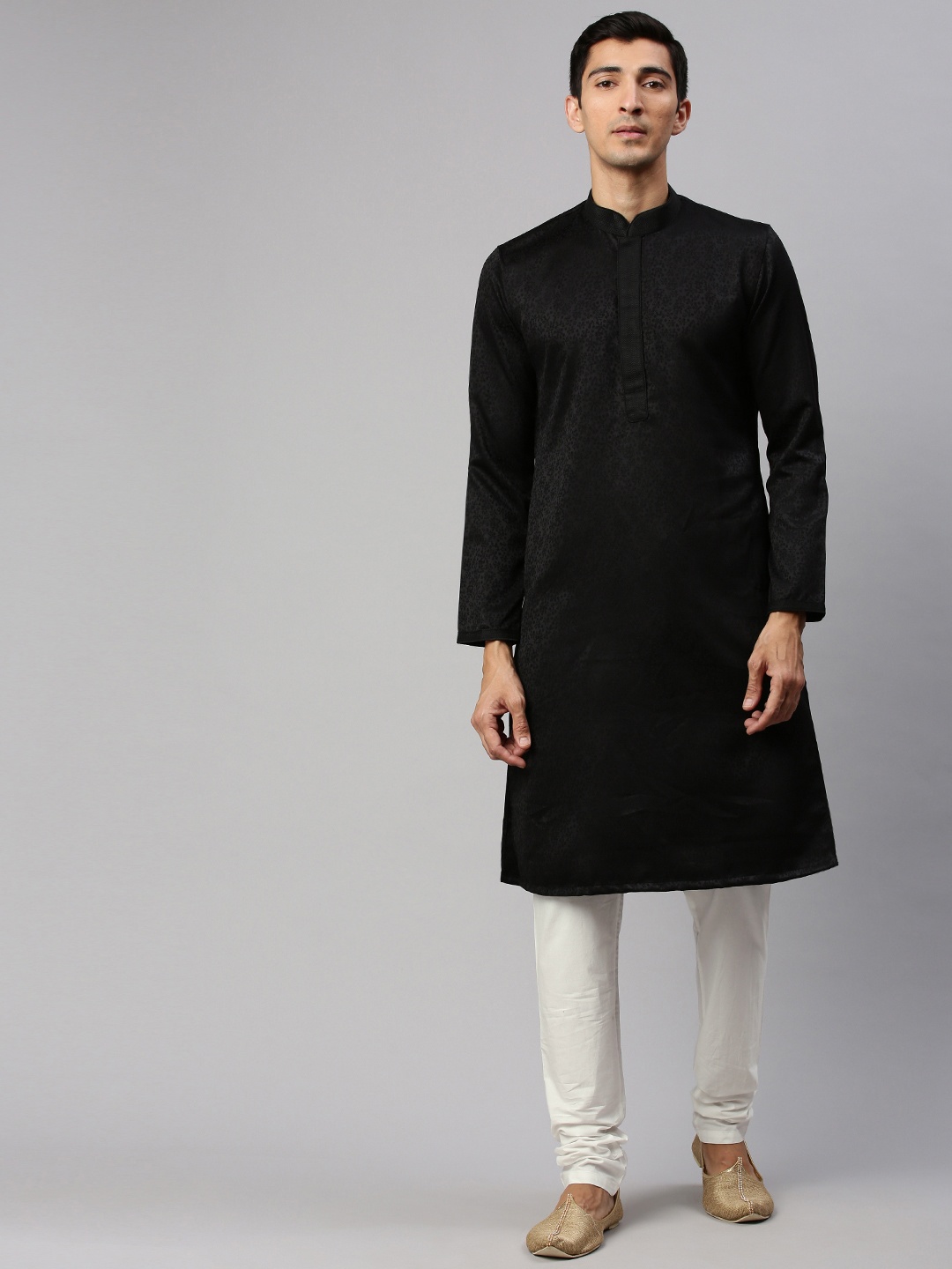 

Manyavar Men Black Woven Design Kurta with Churidar