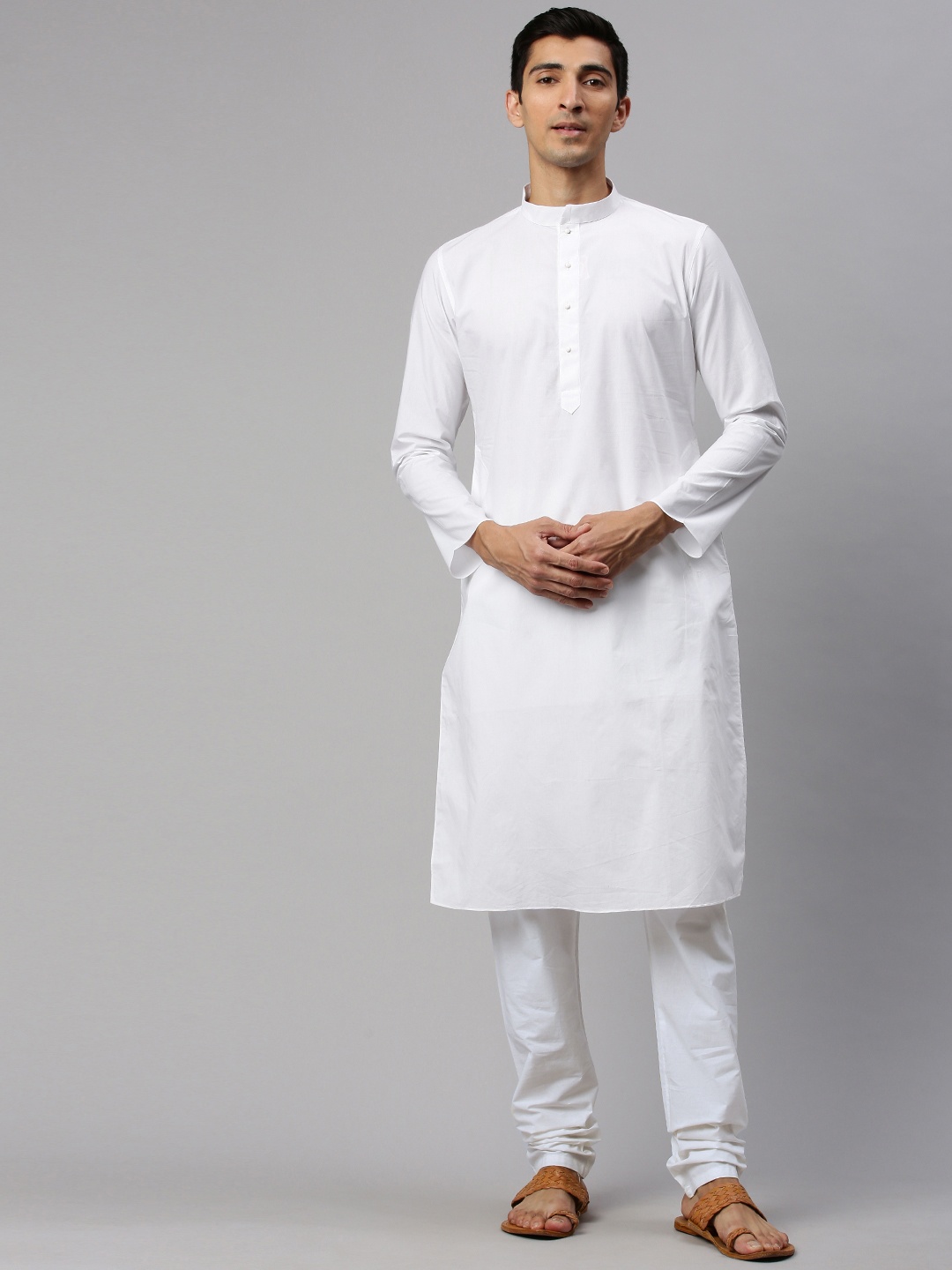 

Manyavar Men White Solid Kurta with Churidar