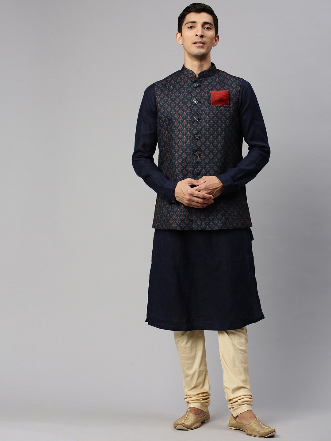 

Manyavar Men Navy Blue & Red Printed Kurta & Churidar with Nehru Jacket