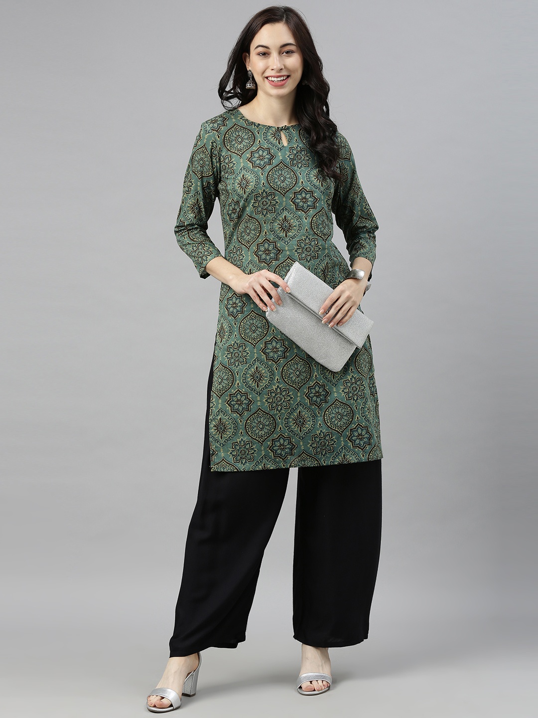 

AHIKA Women Teal Blue Ethnic Motifs Printed Keyhole Neck Kurta