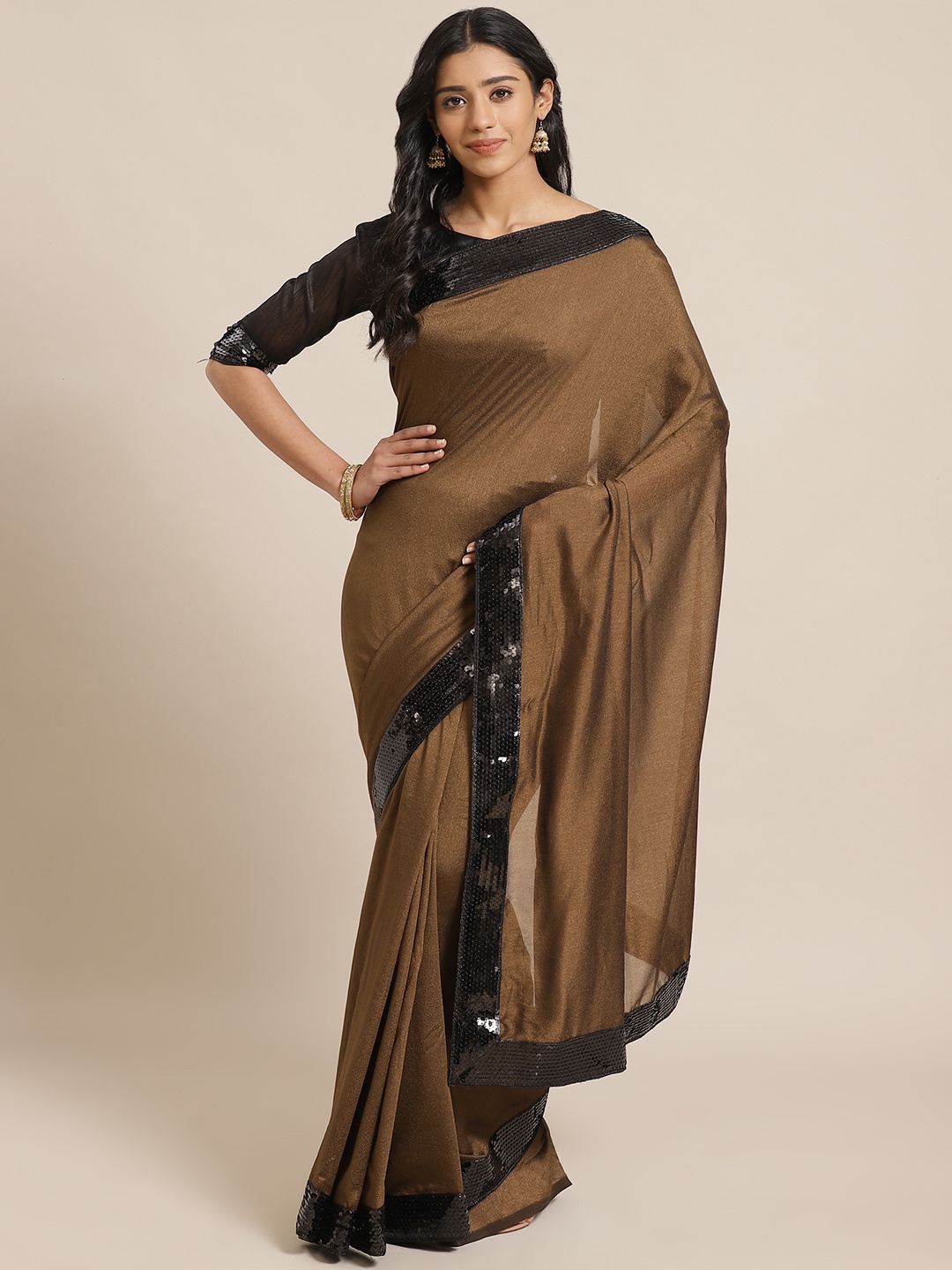 

Saree mall Brown Solid Saree