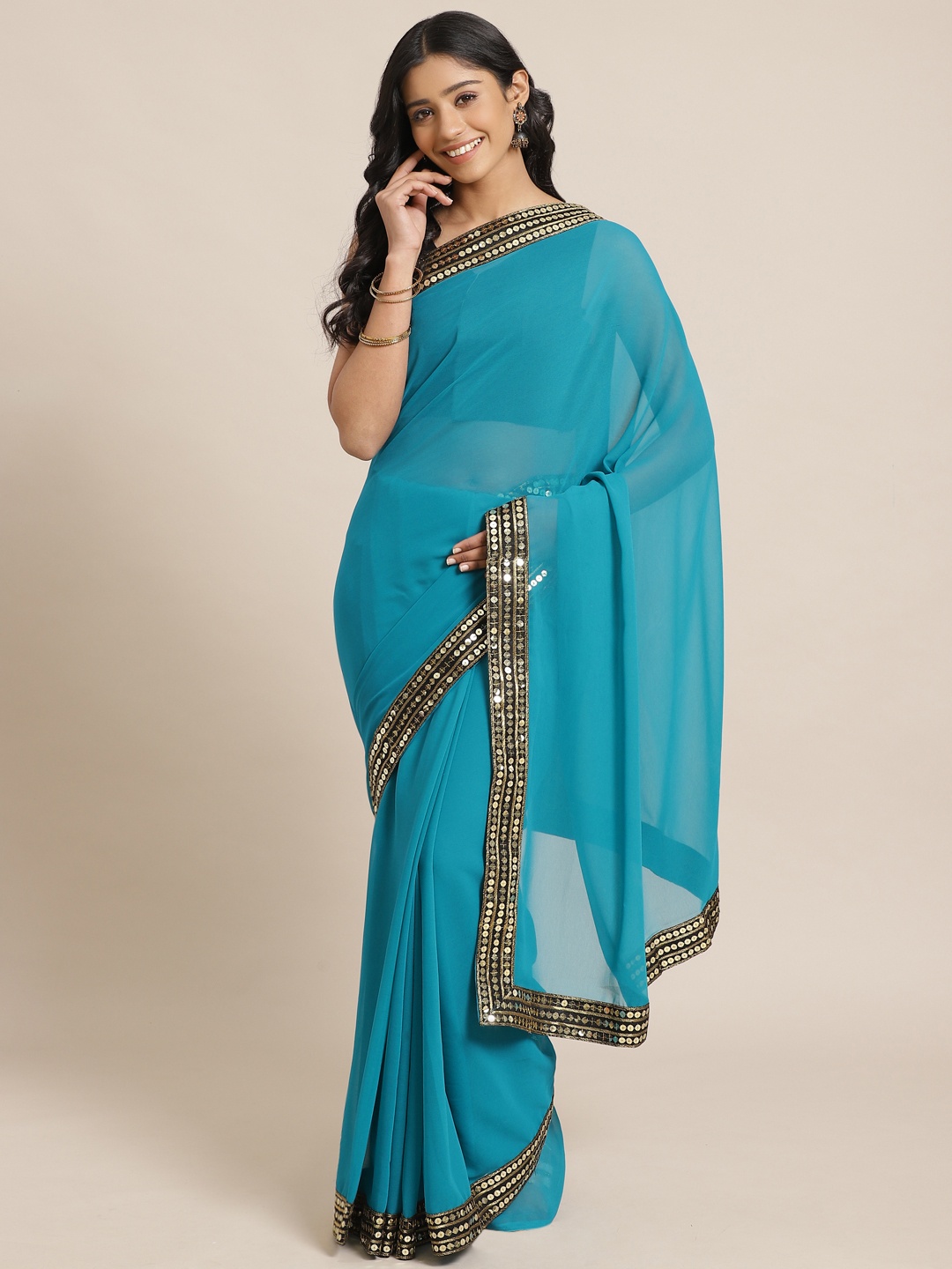 

Saree mall Teal Blue Solid Saree