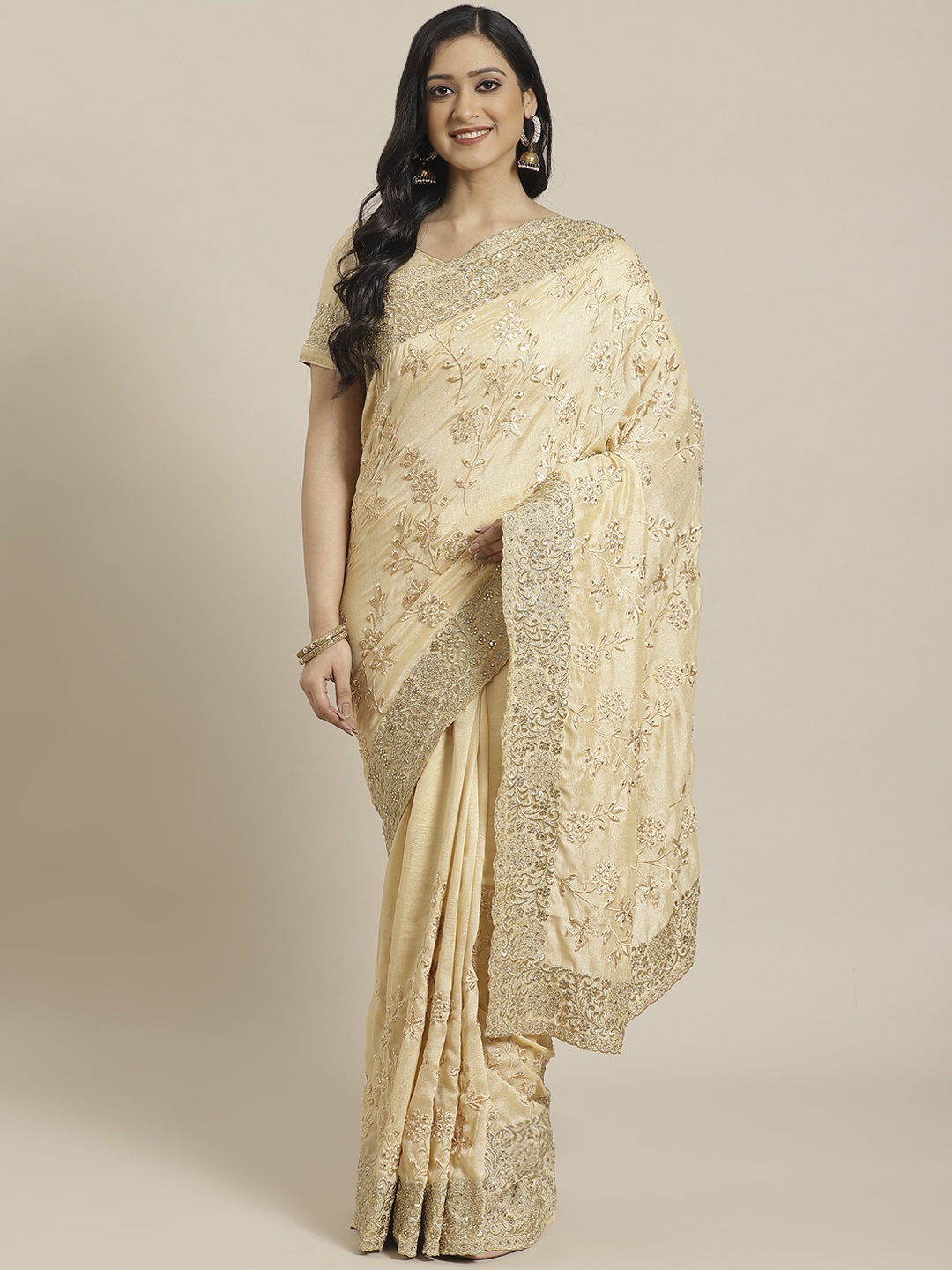 

Readiprint Fashions Beige & Golden Embroidered Saree