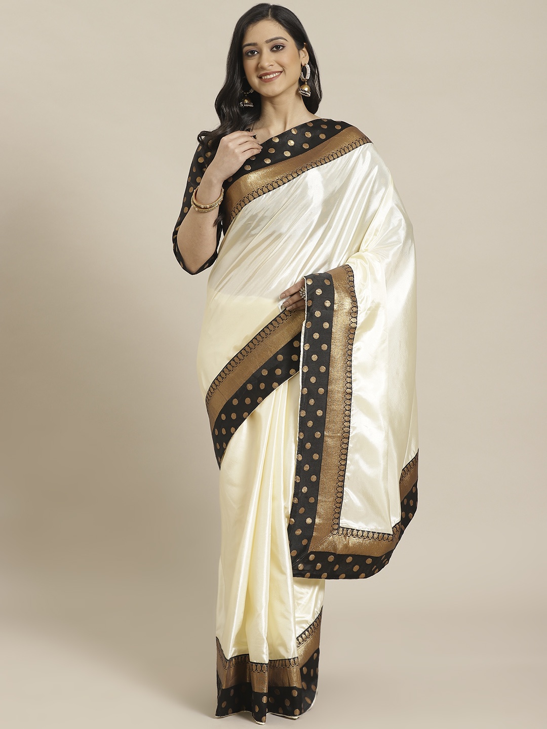 

Readiprint Fashions Cream-Coloured & Black Solid Saree