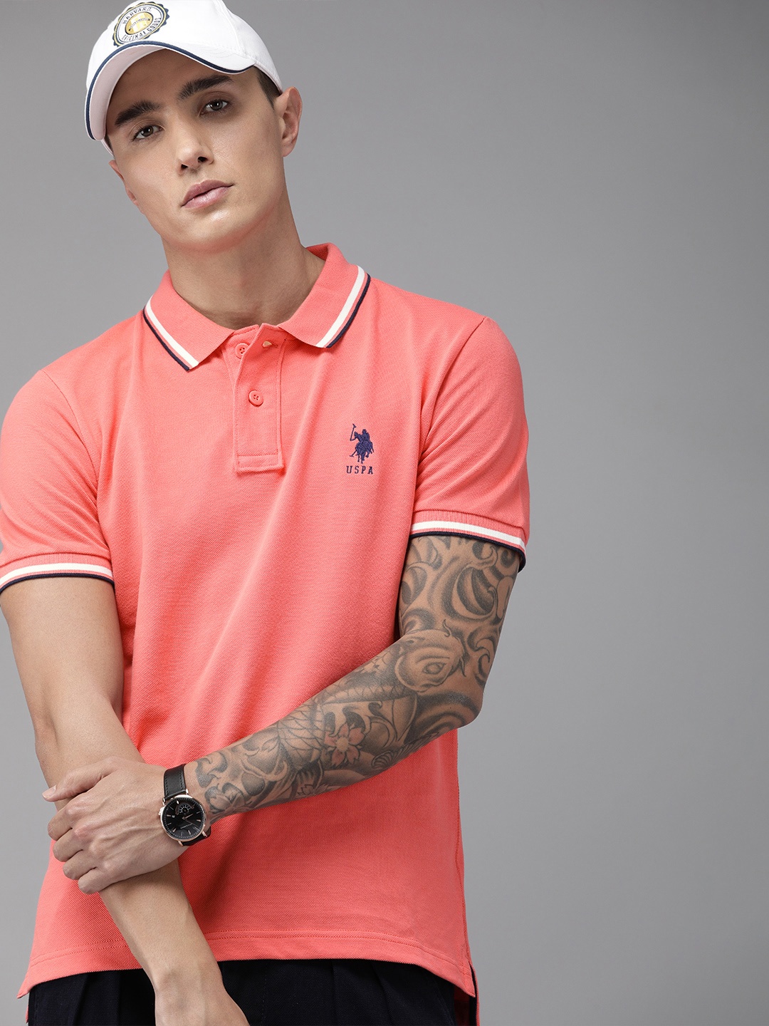 

U.S. Polo Assn. Men Coral Pink Solid Polo Collar Pure Cotton T-shirt With Embroidery