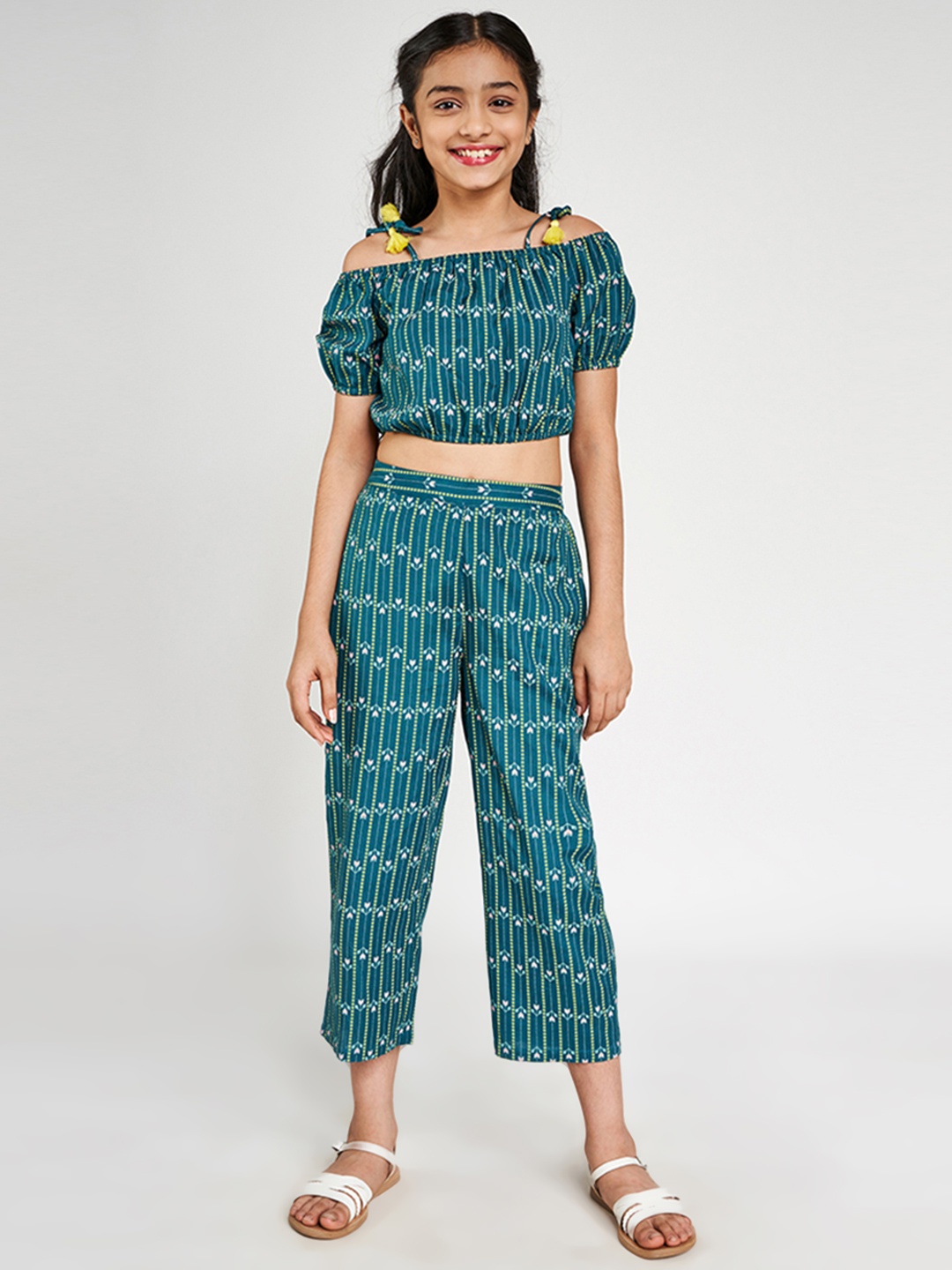 

Global Desi Girls Blue Printed Top with Trousers