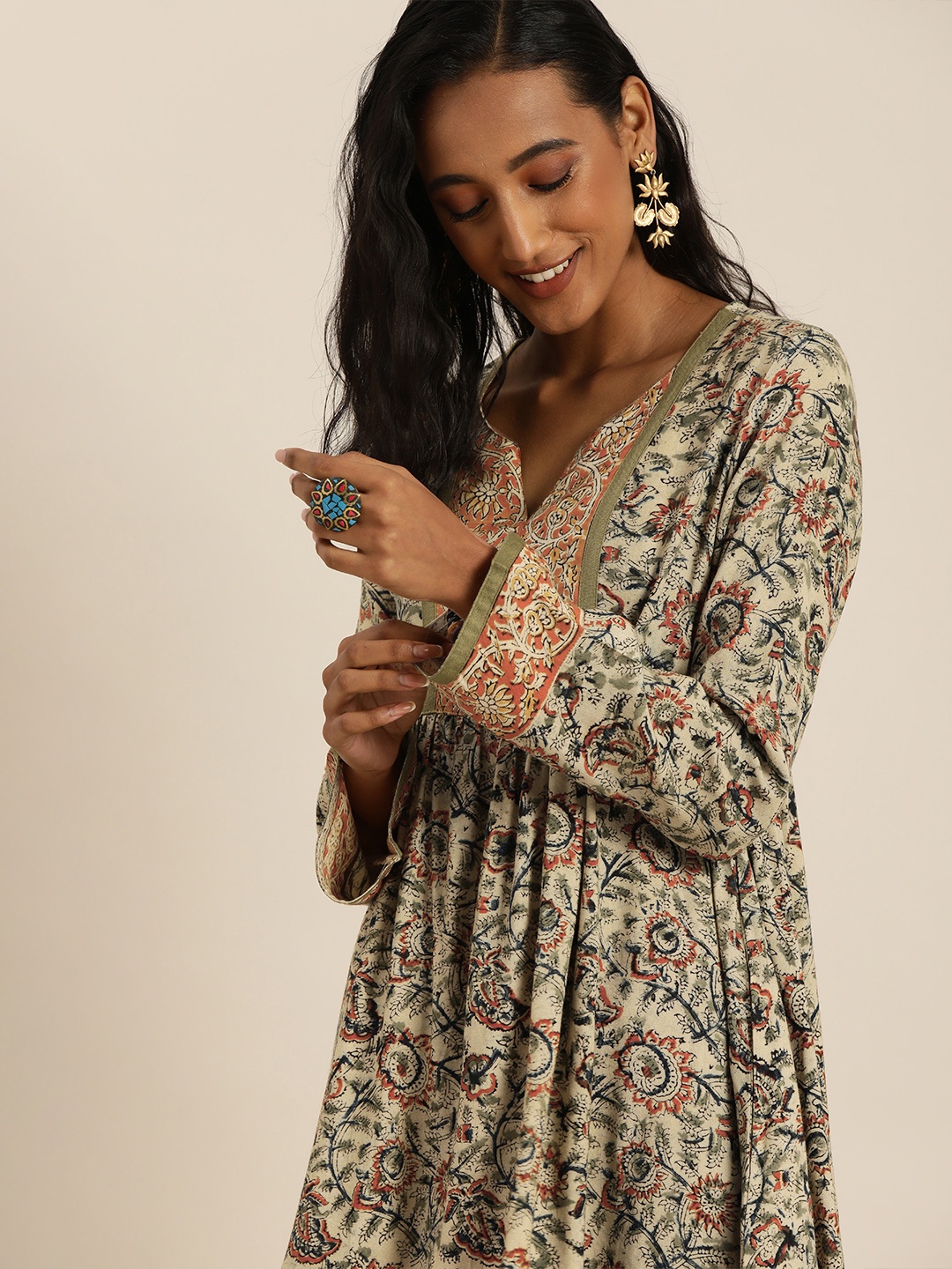 

Taavi Women Beige Kalamkari Hand Block Print Dress with Side Pocket