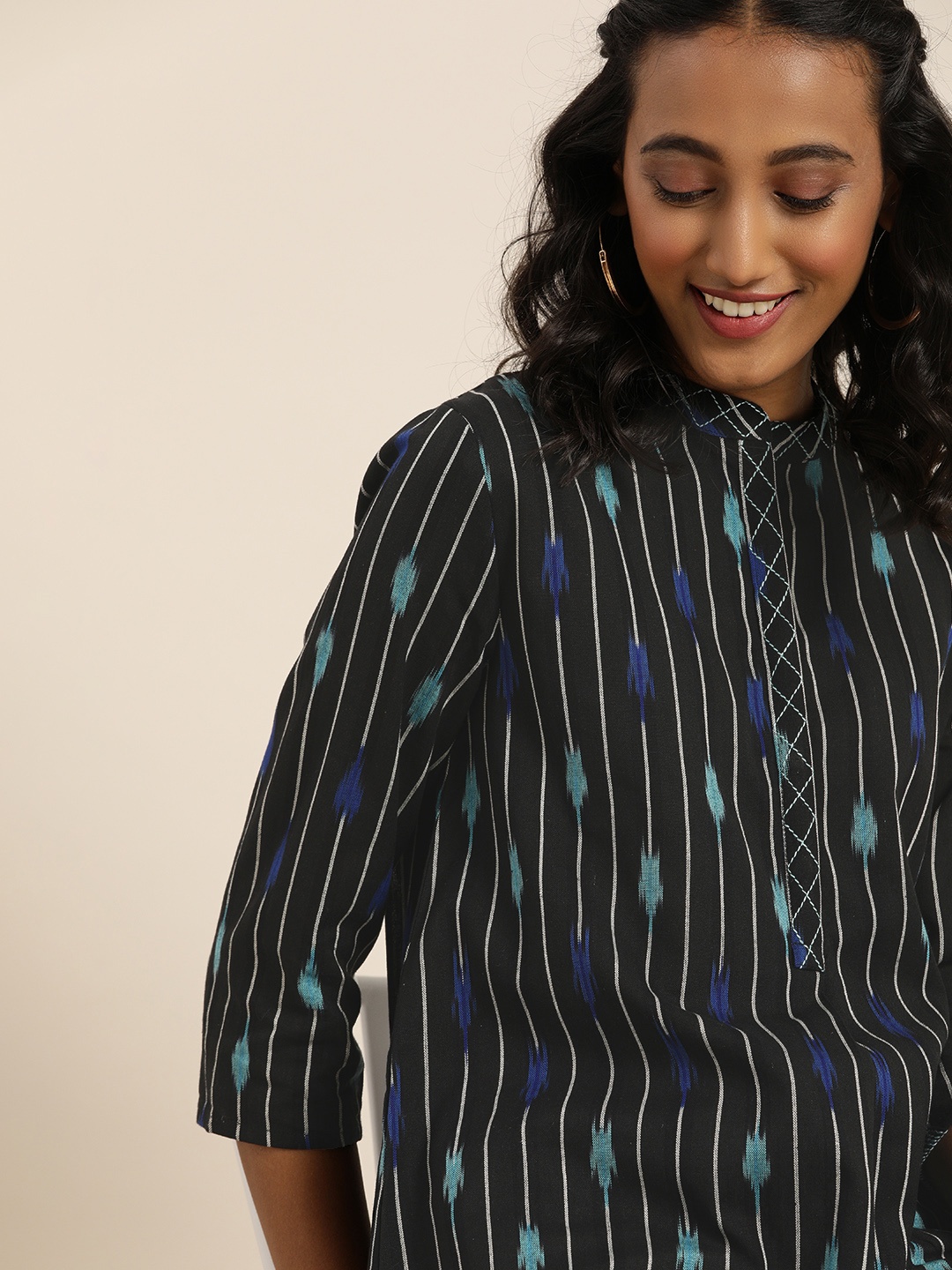 

Taavi Women Black & Blue Ikat A-Line Kurti
