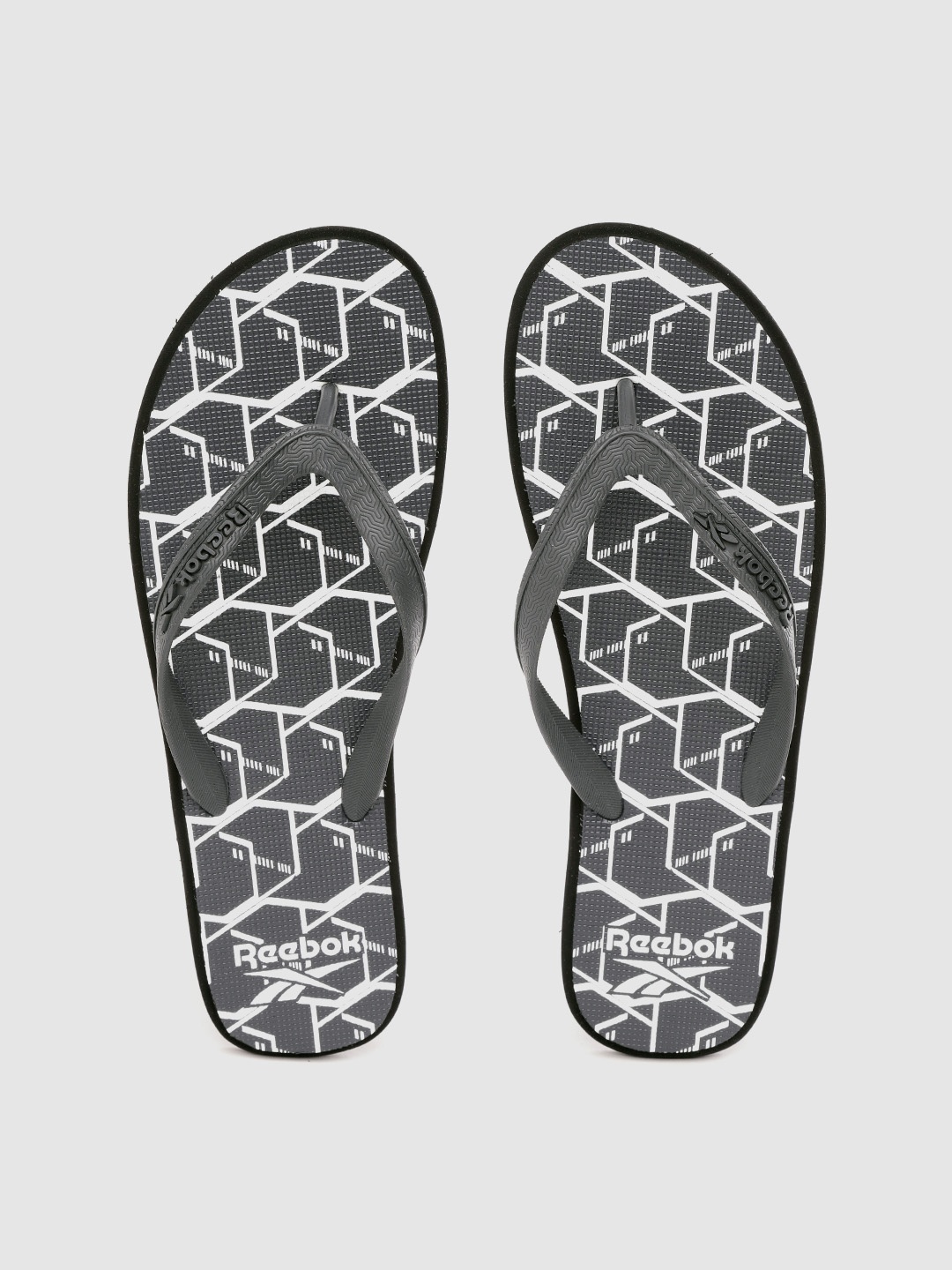 

Reebok Men Charcoal Grey & White Geometric Print Thong Flip-Flops