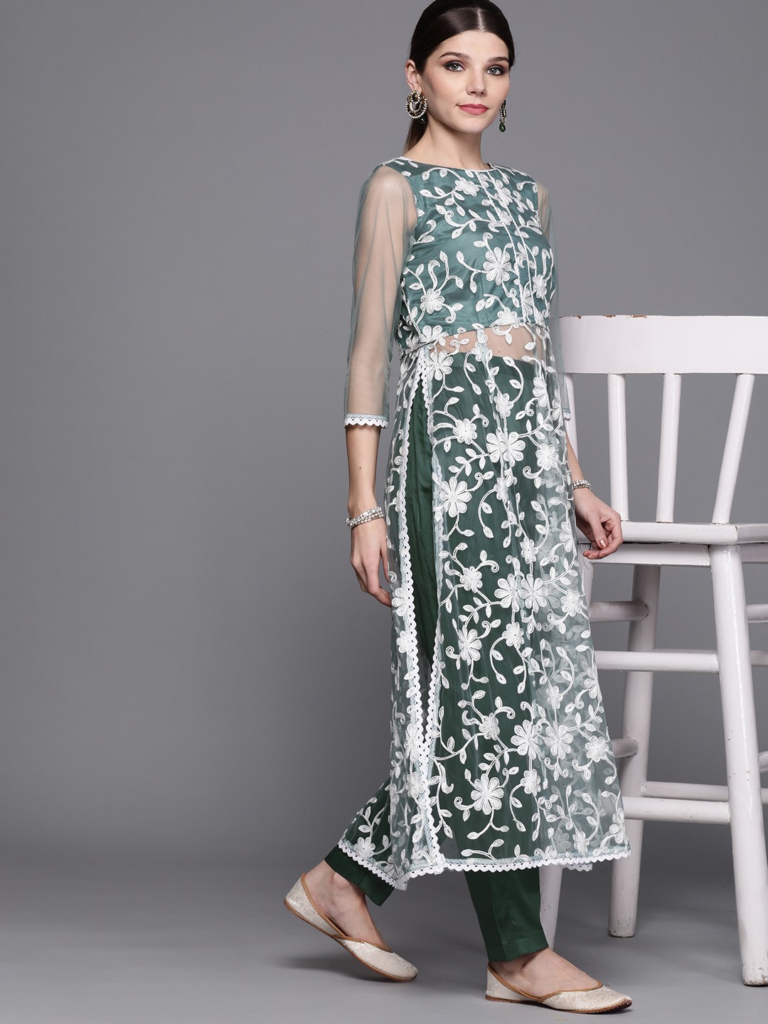 

Inddus Women Green & White Embroidered Kurta with Trousers