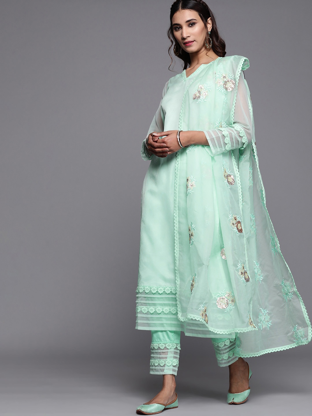 

Inddus Women Sea Green Solid Kurta with Trousers & Dupatta