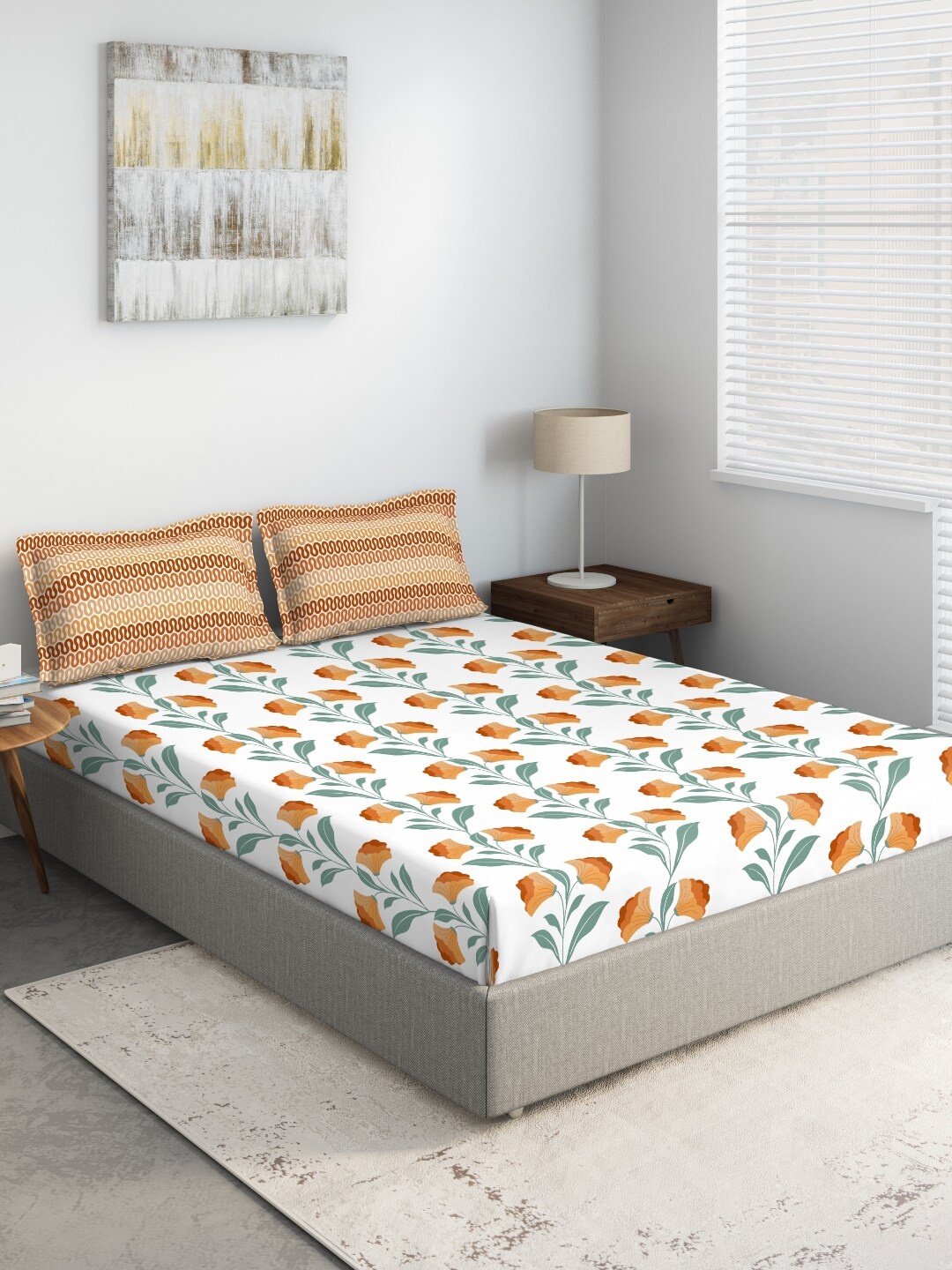 

DDecor White & Orange Printed 144 TC King Bedsheet With 2 Pillow Covers