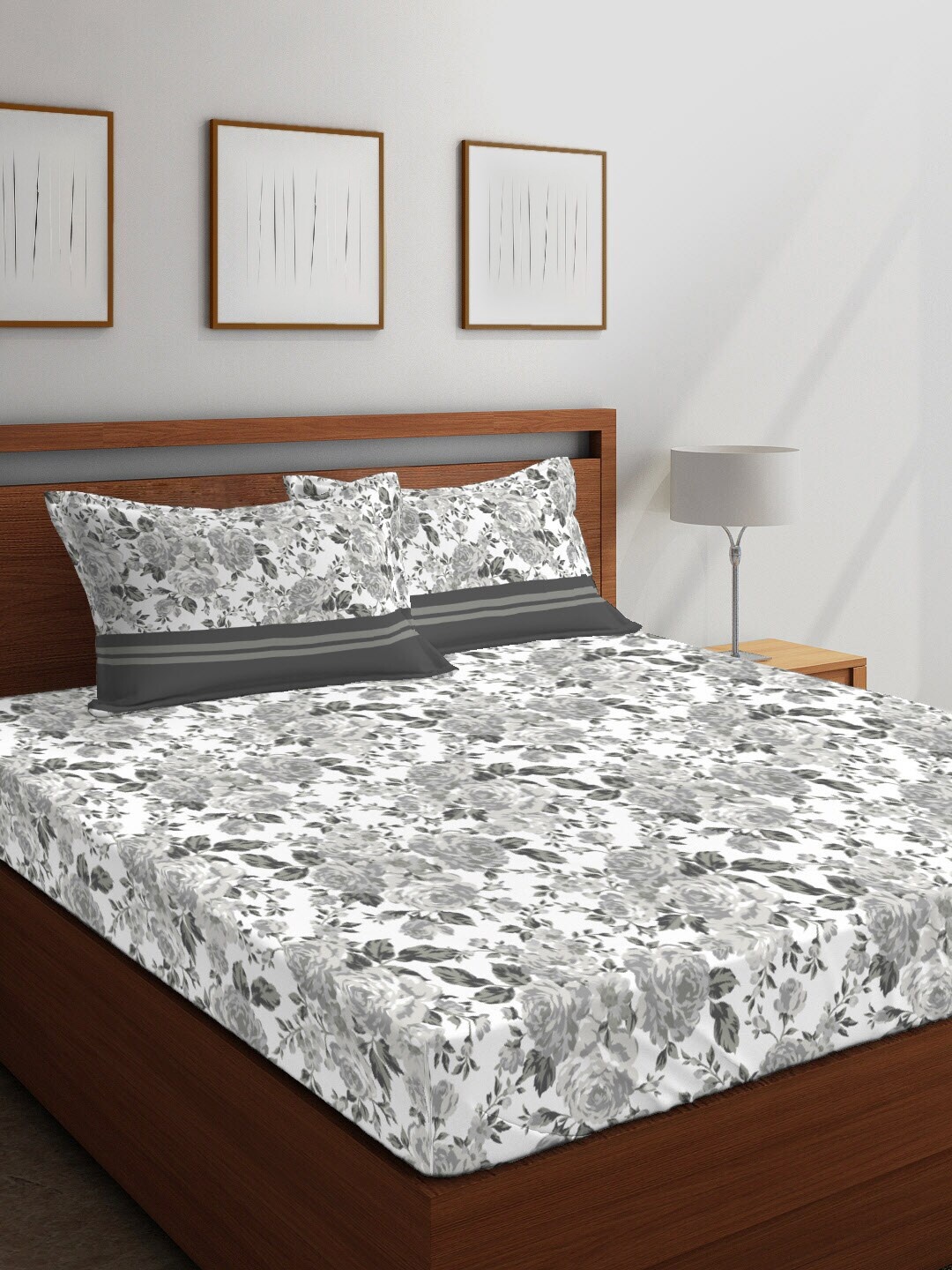 

Layers Grey & White Printed 144 TC Cotton 1 Queen Bedsheet with 2 Pillow Covers