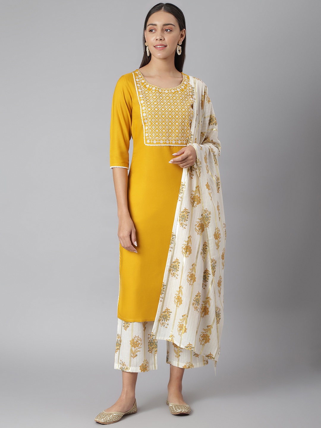 

Khushal K Women Yellow & White Embroidered Kurta with Trousers & Dupatta