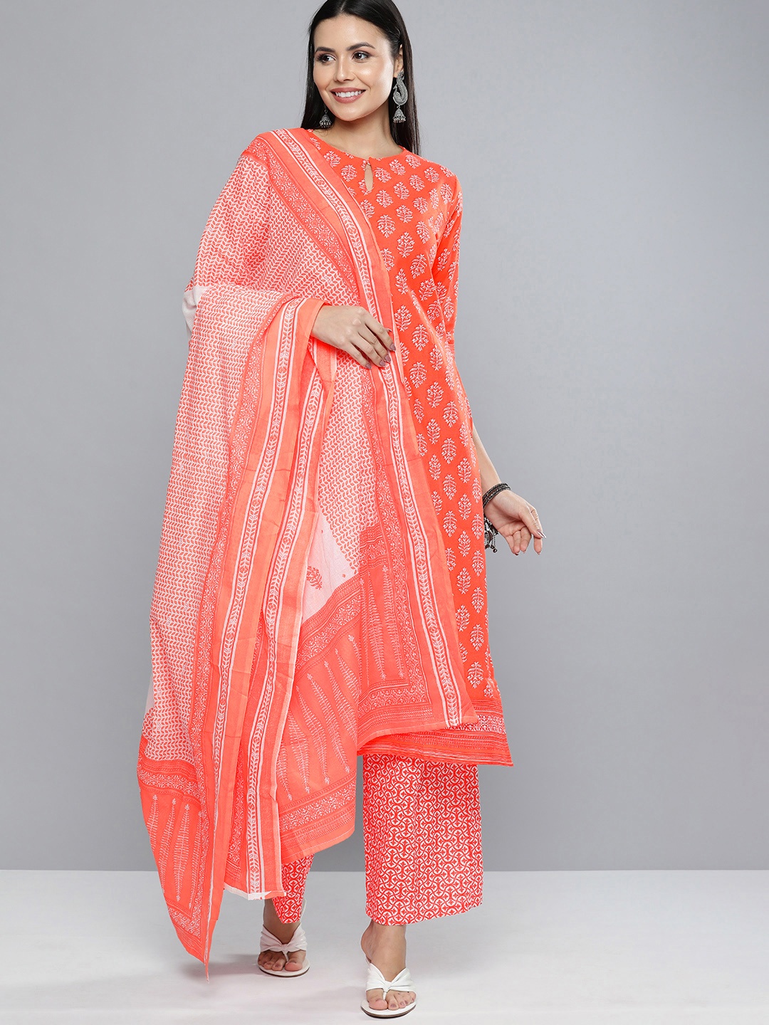

Vishudh Women Coral Orange & Off-White Printed Kurta with Palazzos & Dupatta
