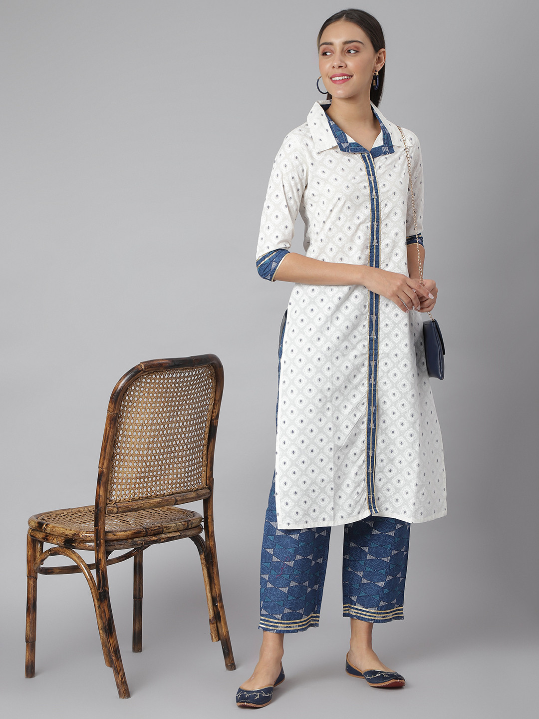 

Khushal K Women White Printed Kurta with Palazzos