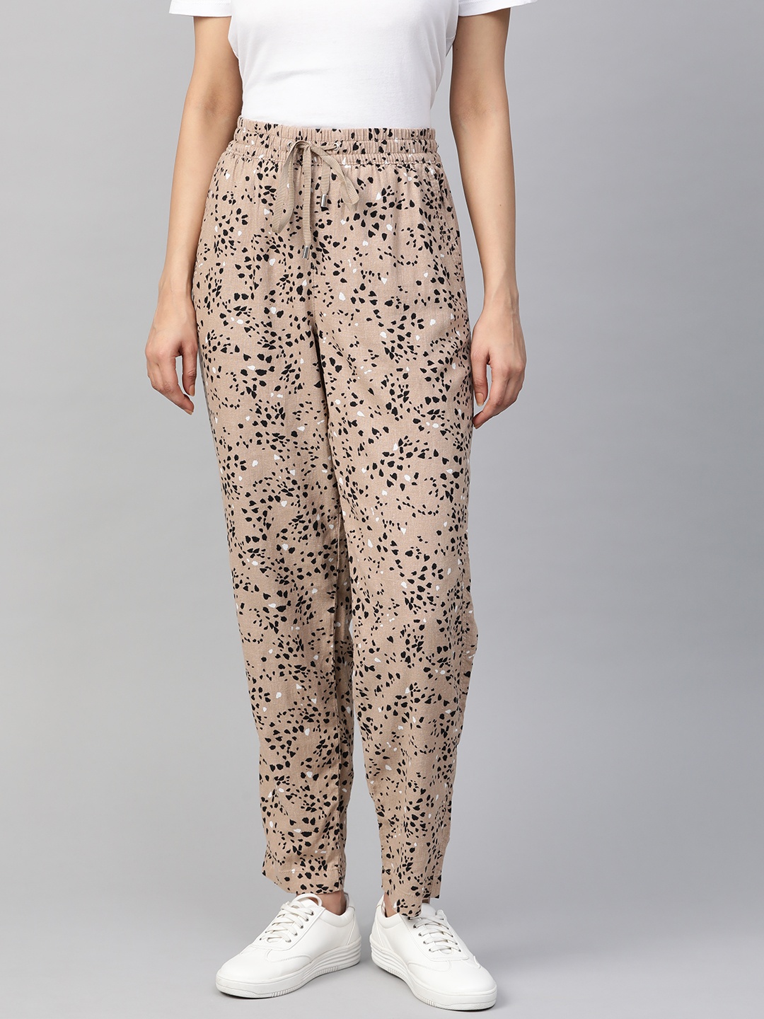 

Marks & Spencer Women Beige & Black Tapered Fit Printed Peg Trousers