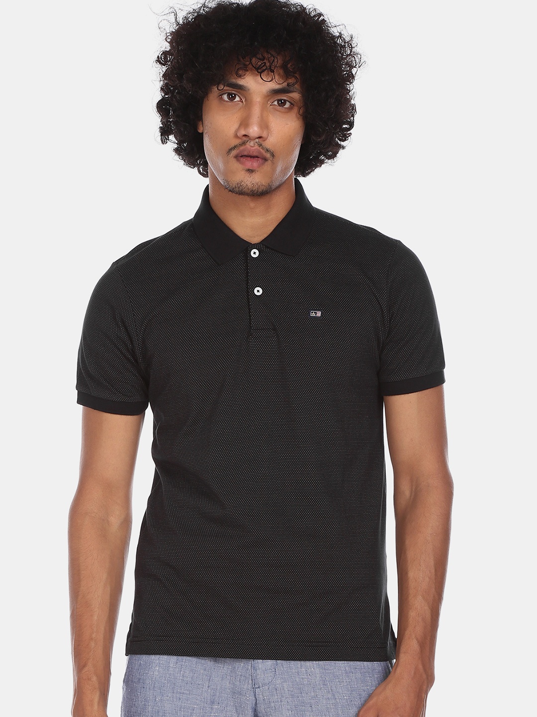 

Arrow Sport Men Black Self Design Polo Collar T-shirt