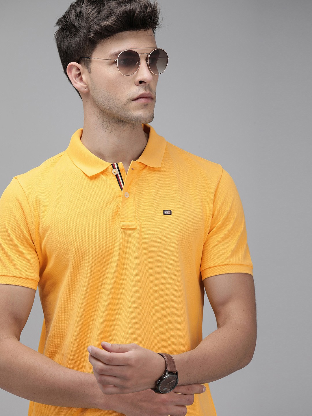 

Arrow Sport Men Yellow Solid Polo Collar T-shirt