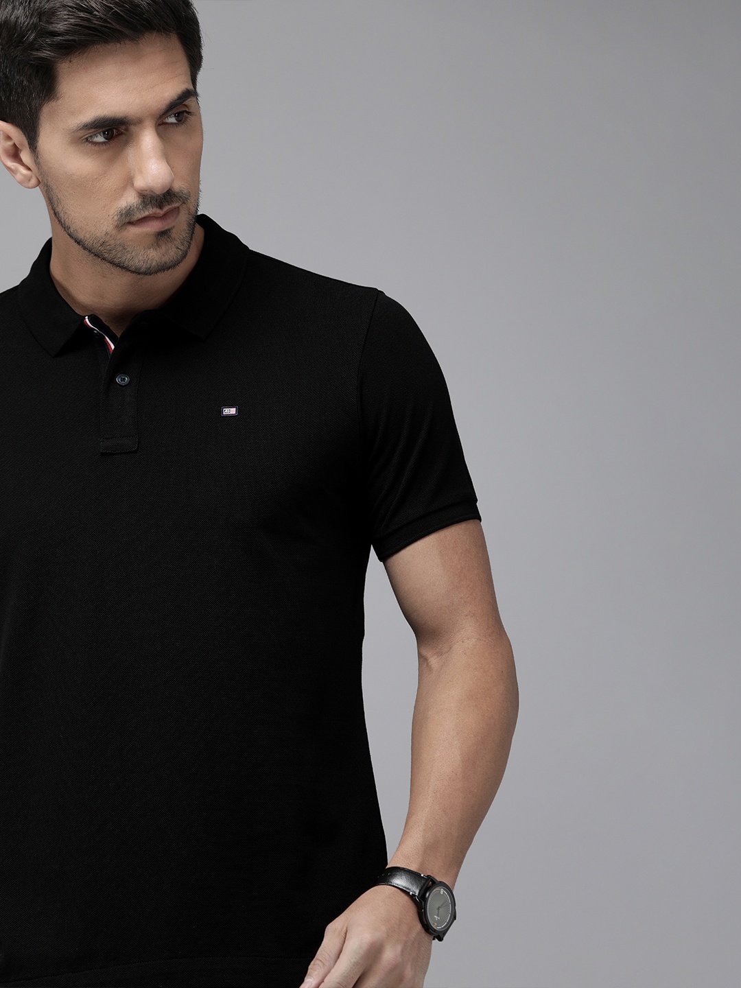

Arrow Sport Men Black Pure Compact Cotton Solid Polo Collar Pure Cotton T-shirt