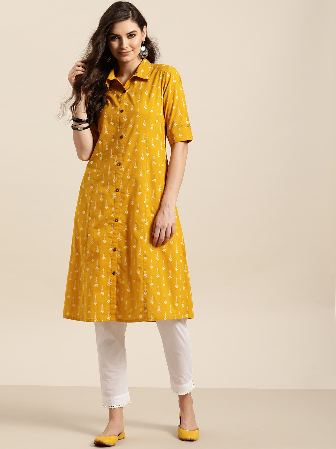 

Sangria Women Mustard Yellow & White Floral Print A-Line Kurta