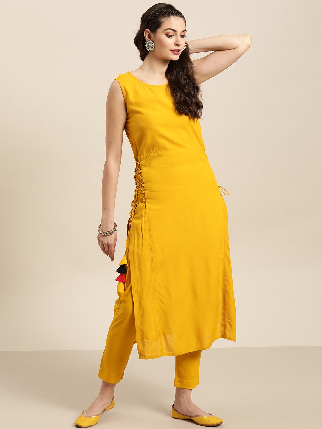 

Sangria Women Yellow Solid Straight Kurta