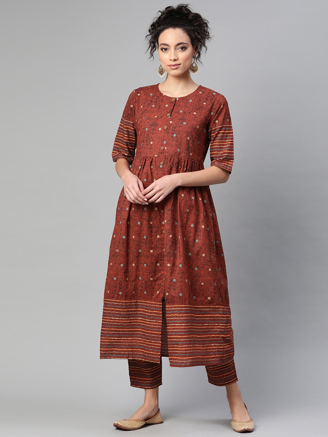 

Indo Era Women Rust Brown & Black Pure Cotton Foil Printed Kurta with Trousers