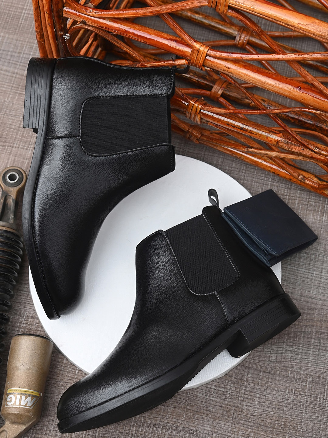 

Hirels Men Black Textured Synthetic Leather Mid-Top Chelsea Flat Boots