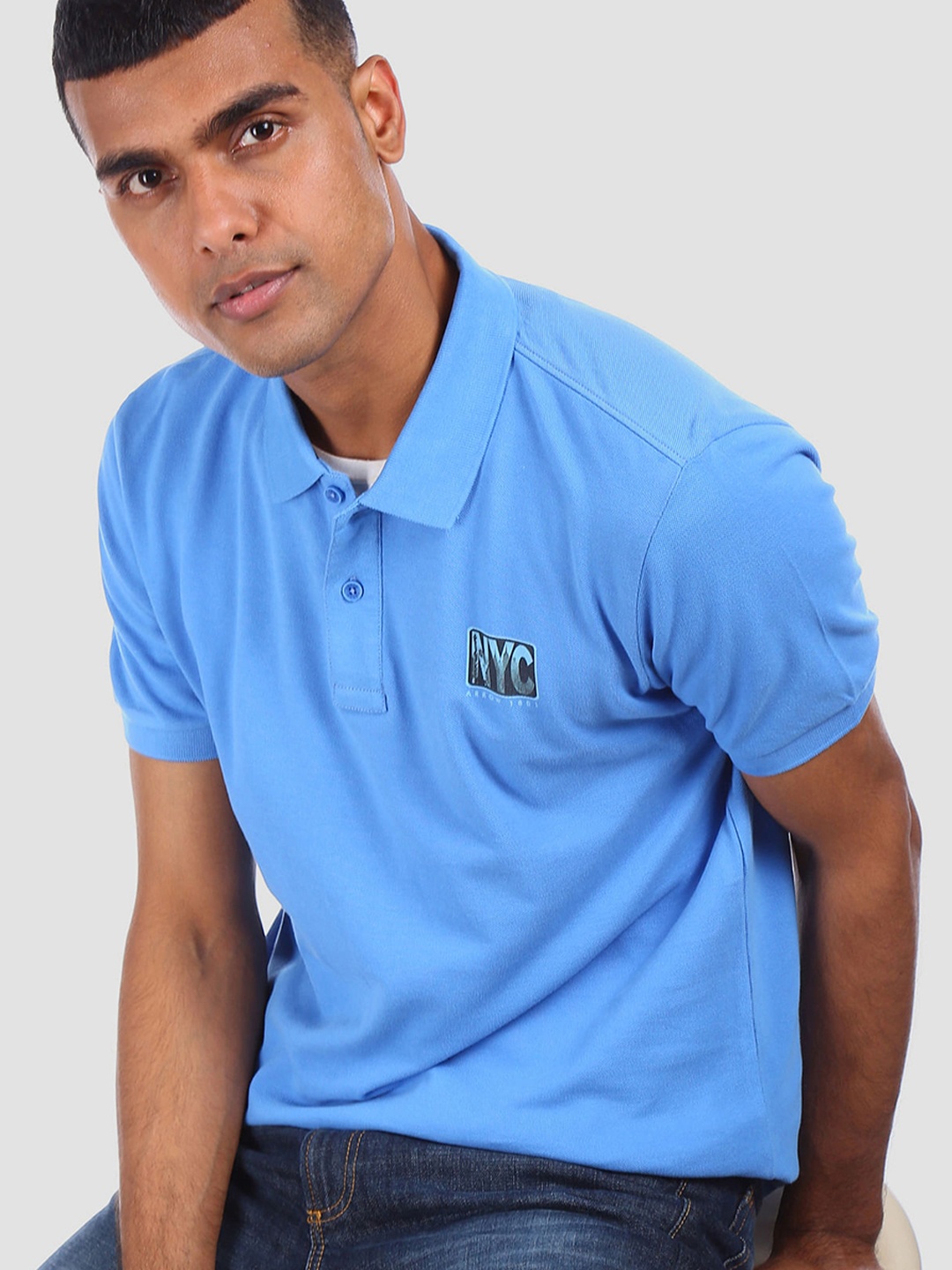 

Arrow Sport Men Blue Solid Polo Collar T-shirt