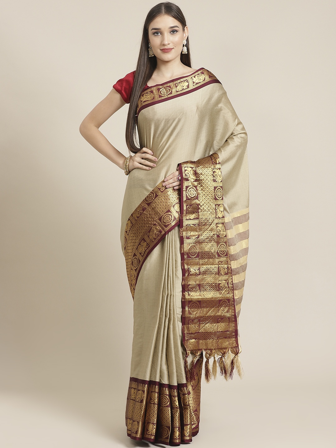 

Mitera Taupe & Golden Pure Silk Solid Banarasi Saree