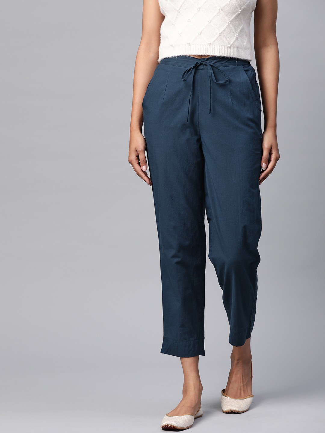 

Fabindia Women Navy Pure Cotton Tapered Solid Cropped Trousers, Navy blue