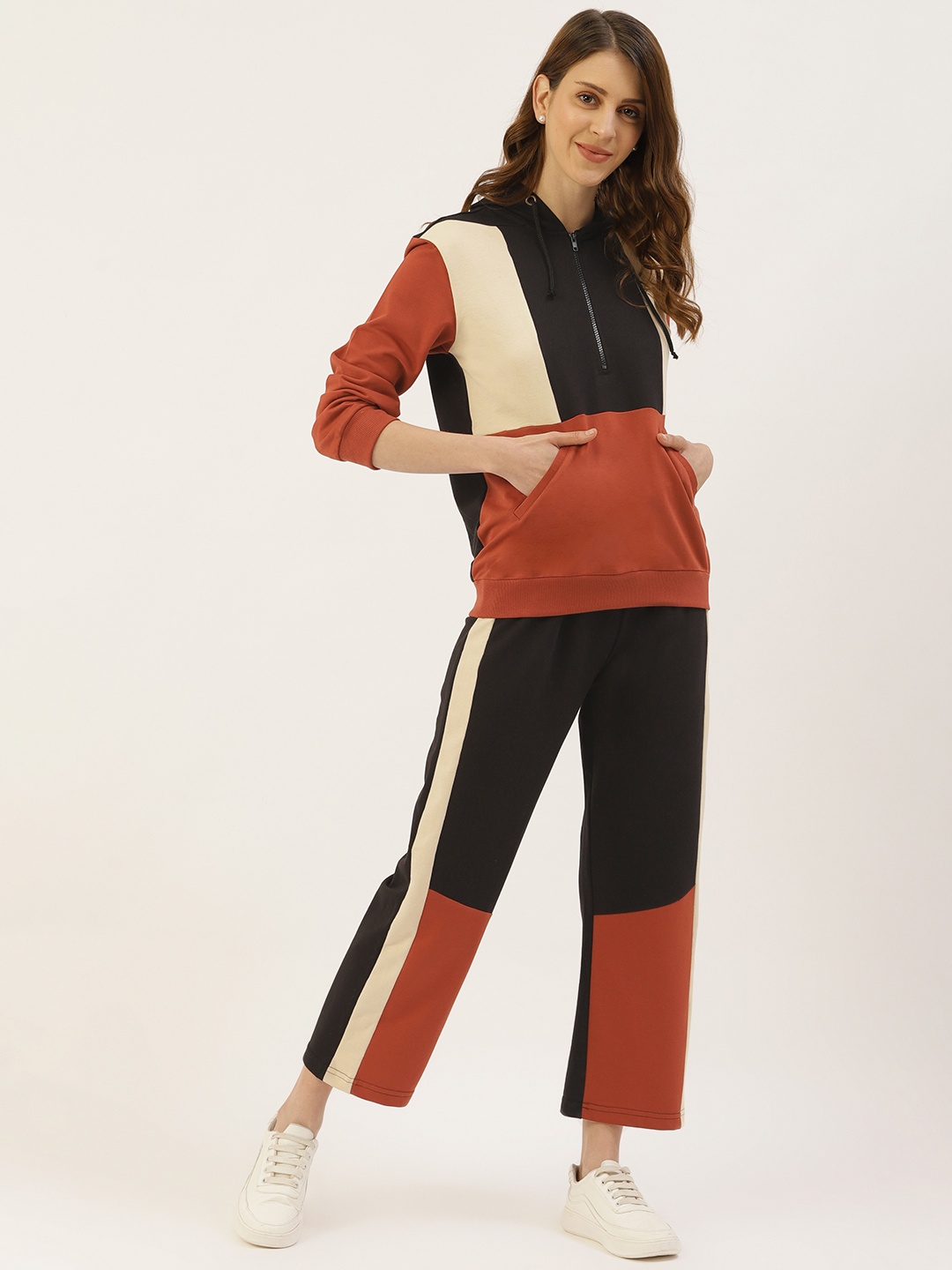 

Laabha Women Black & Rust Orange Colourblocked Tracksuit