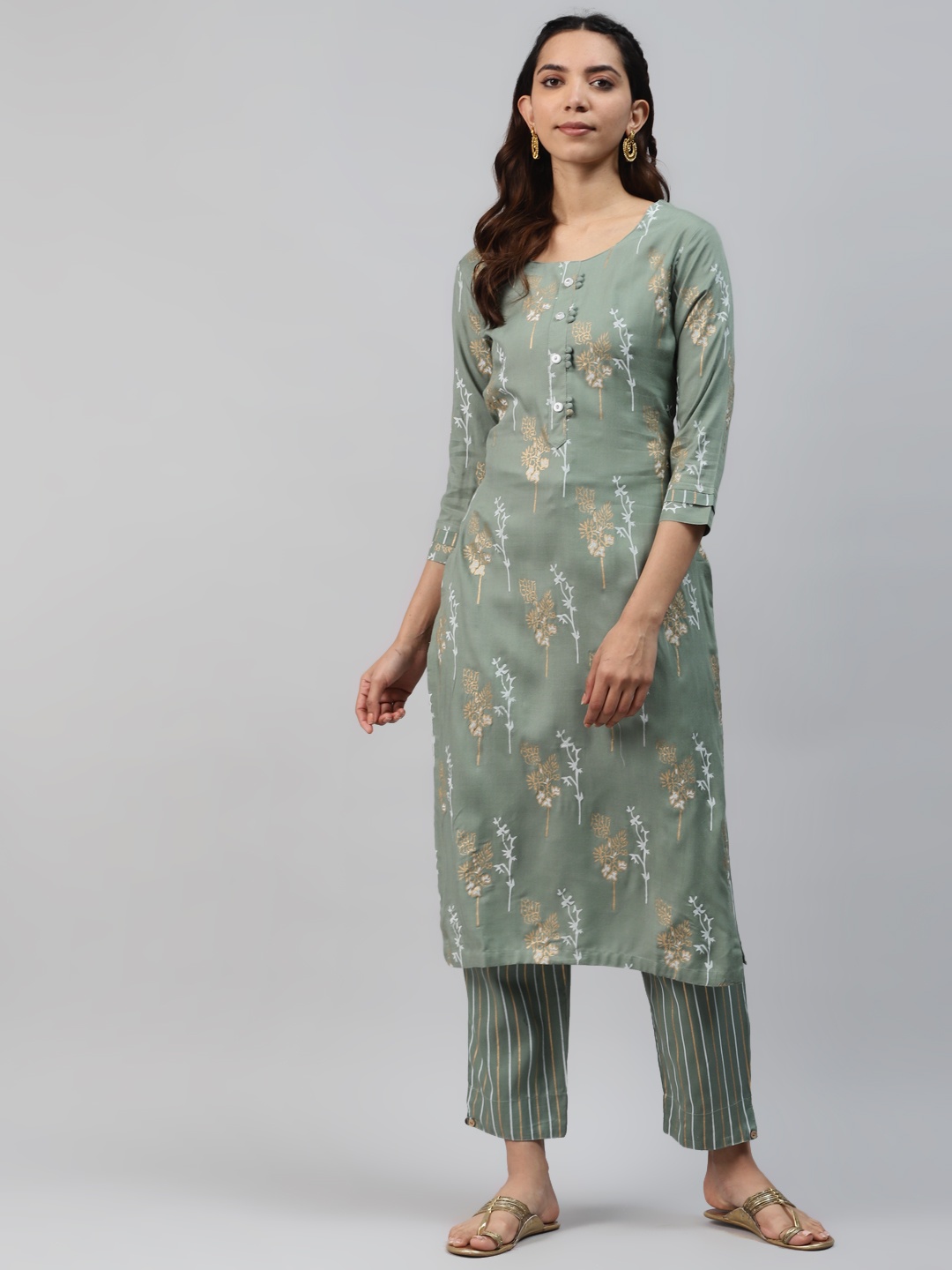 

HIGHLIGHT FASHION EXPORT Women Green & Golden Printed Kurta with Trousers