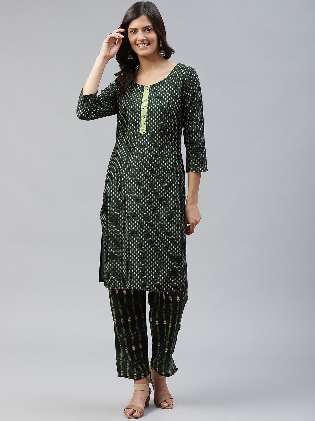 

HIGHLIGHT FASHION EXPORT Women Green & Golden Printed Kurta with Trousers