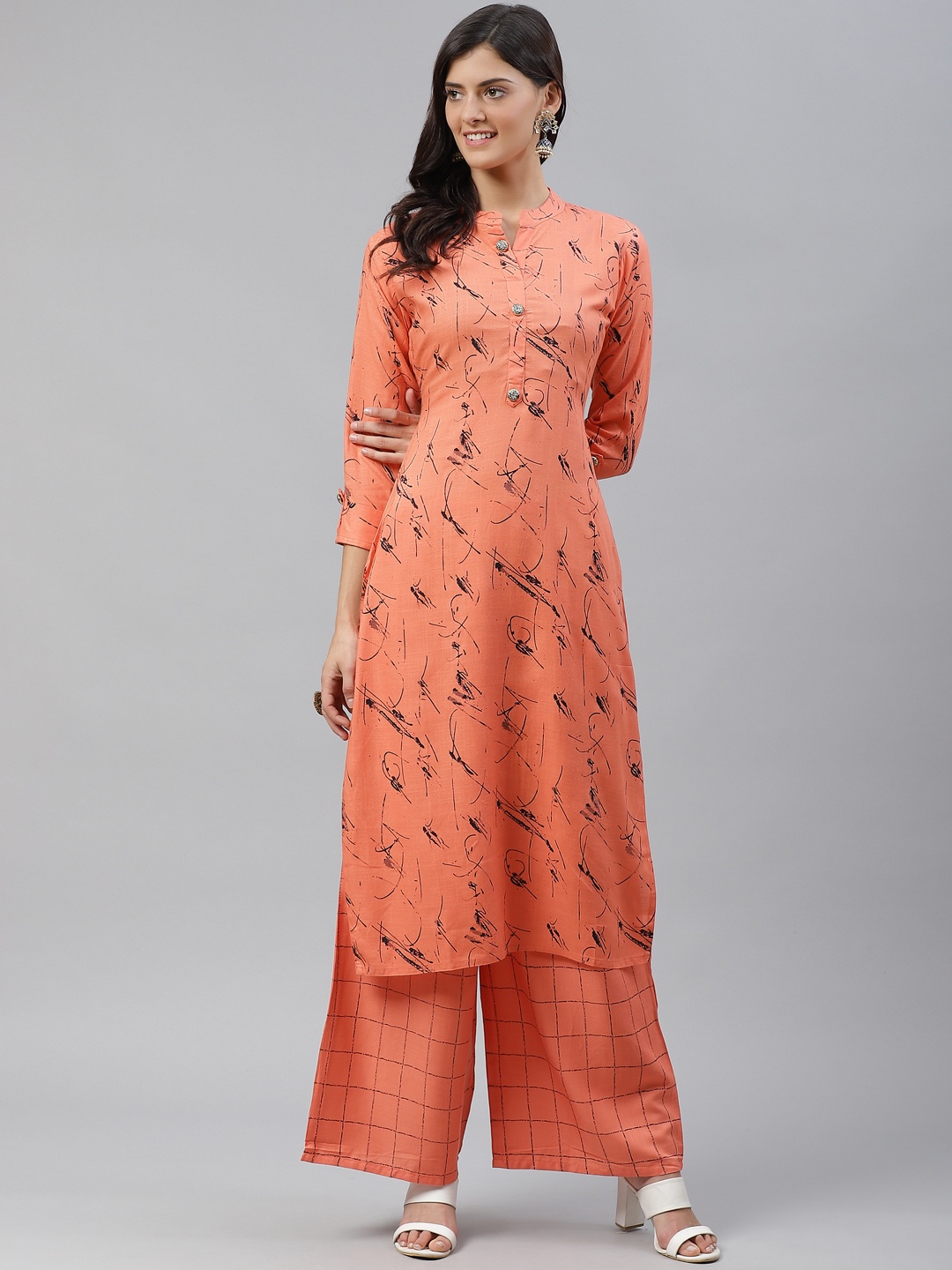

HIGHLIGHT FASHION EXPORT Women Orange & Black Printed Kurta with Palazzos